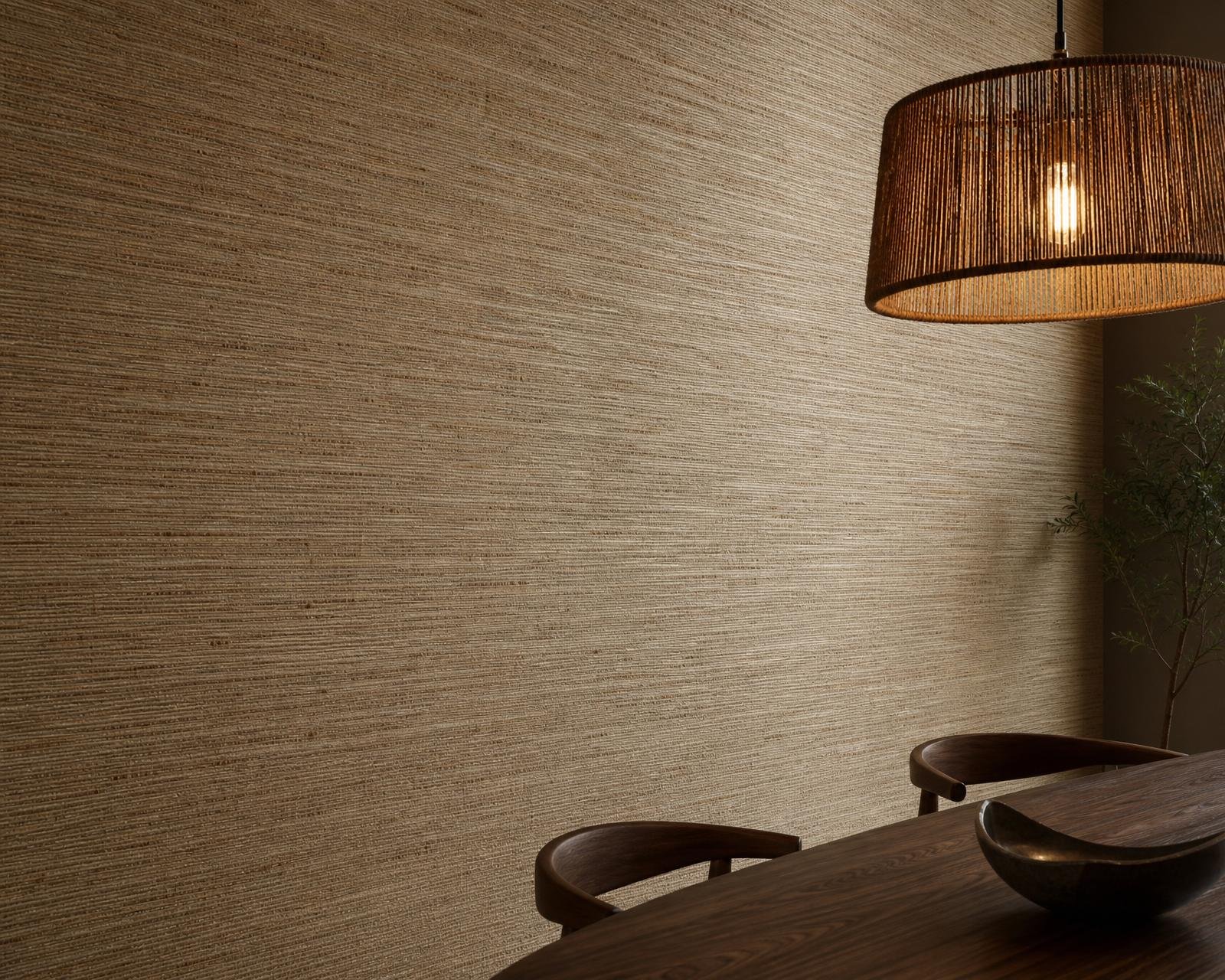 Natural seagrass grasscloth wallpaper in oatmeal honey covering a Dubai dining room wall