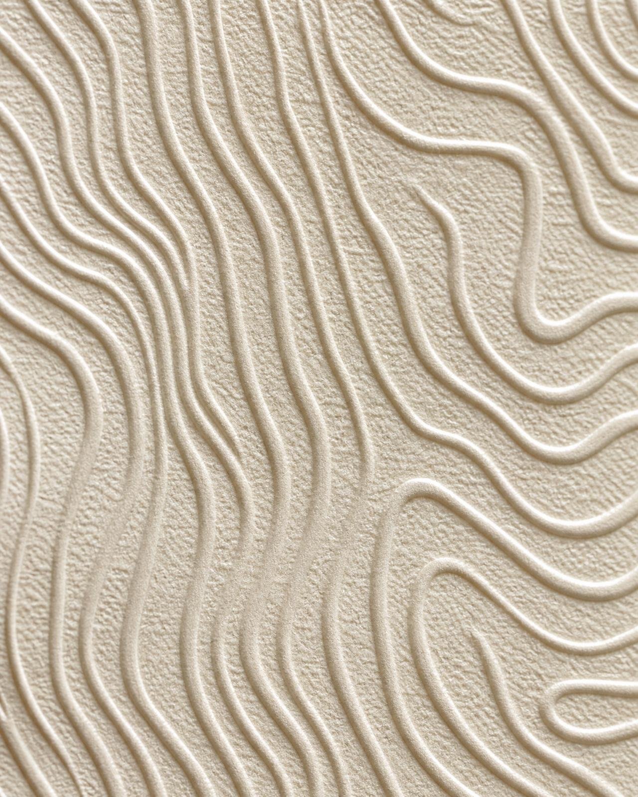 Macro of embossed organic ripple raised-relief wallpaper on cream stock