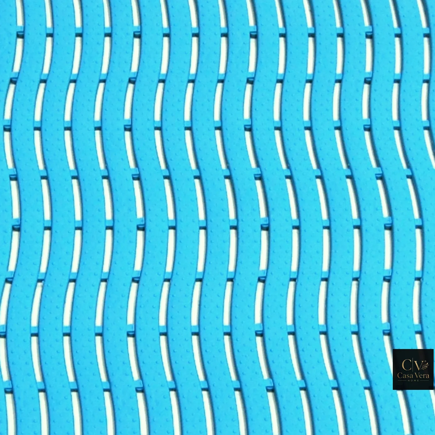 Close view of the open blue wave structure of a CV-Wave wet area mat