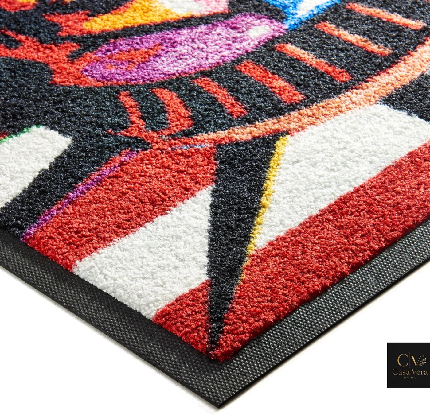 Corner detail of a boldly printed Jet Print Eco mat showing fibre pile and edge